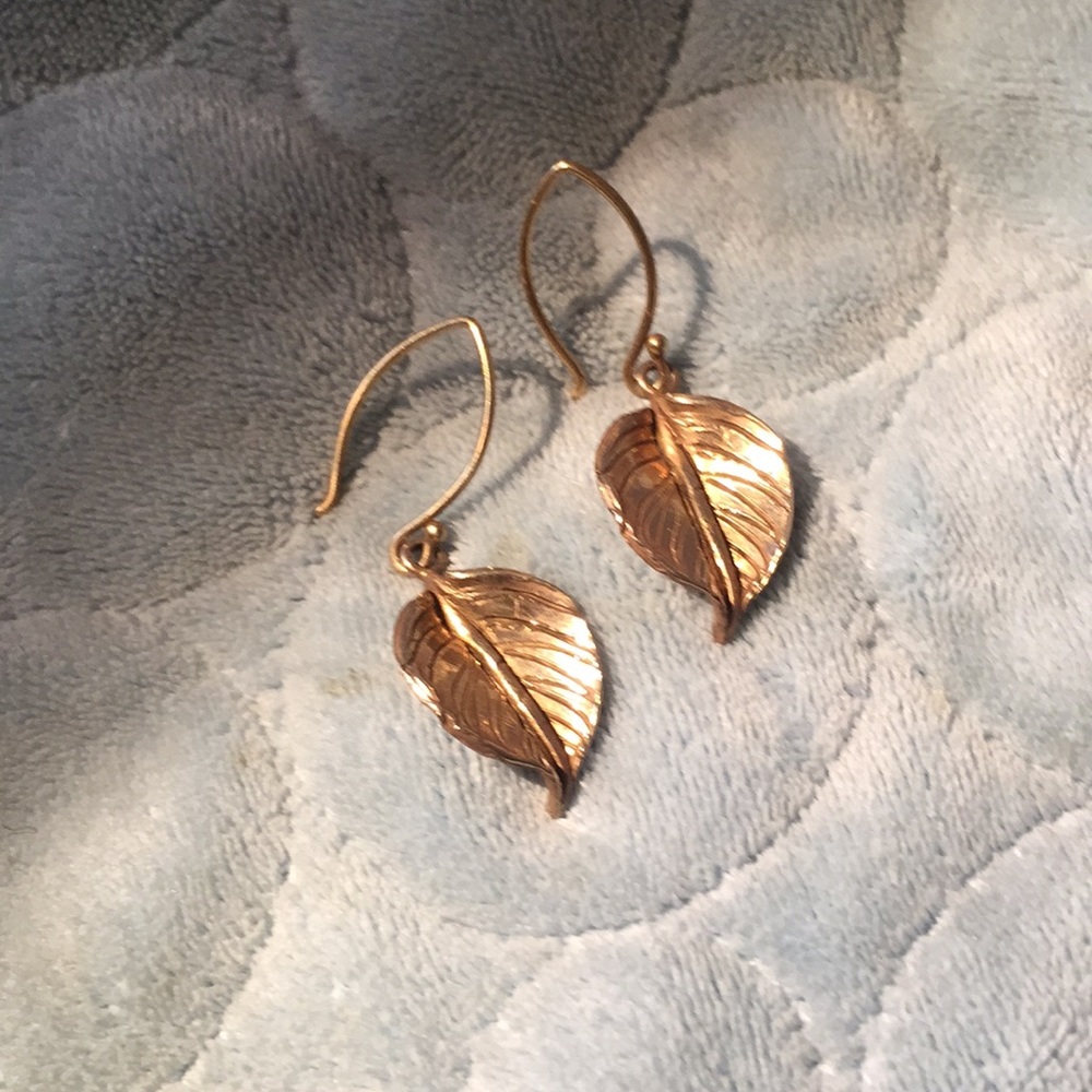 Tracy Matthews Designs dangly leaf earrings.